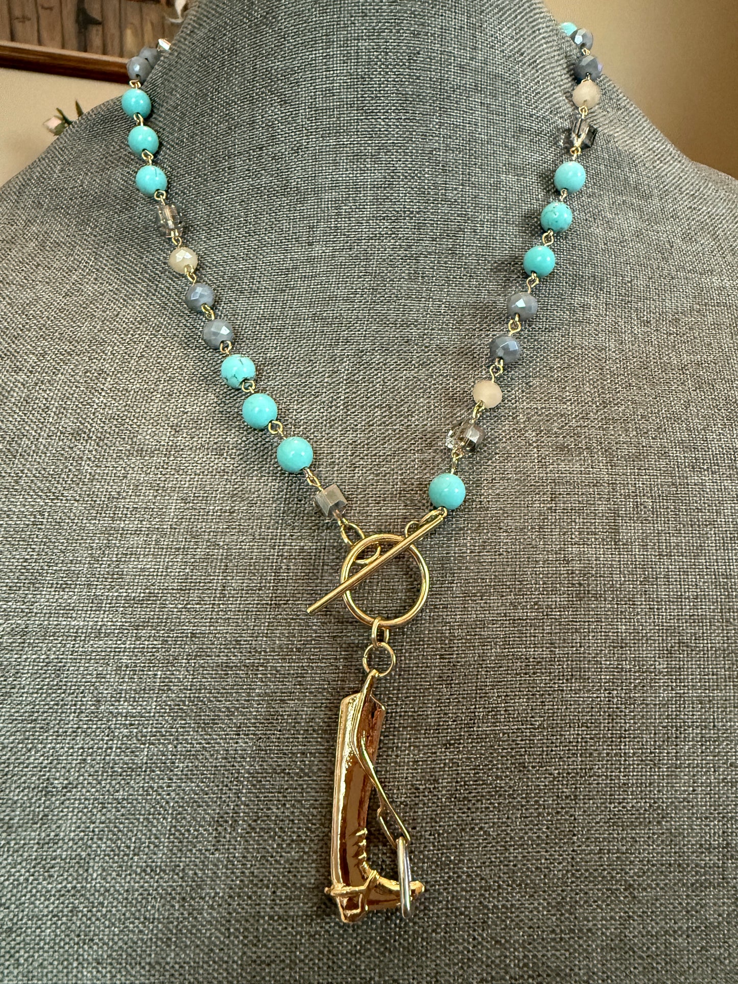 Turquoise rosary beaded english boot necklace