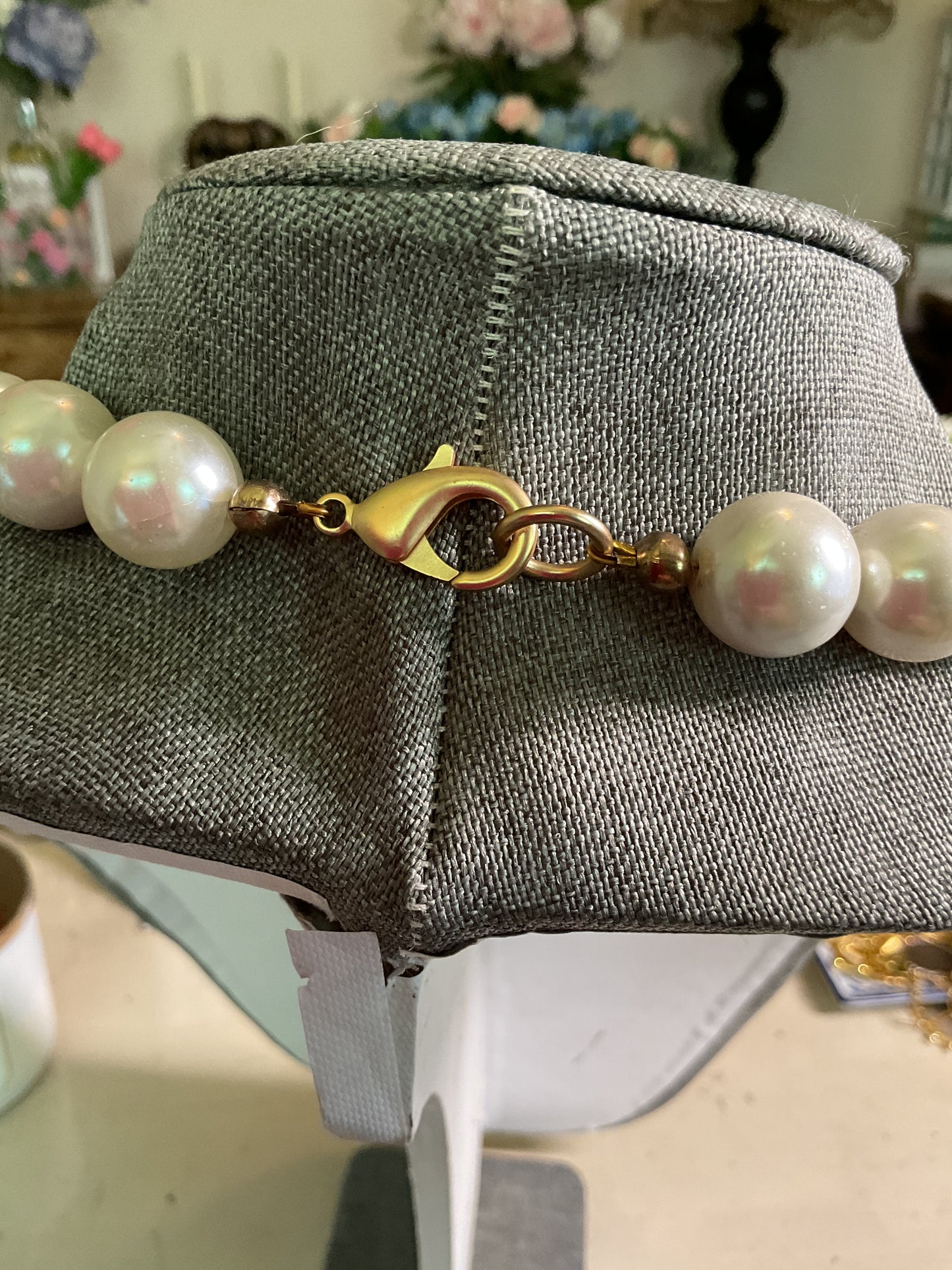 Pearl short necklace with a gold cross pendant