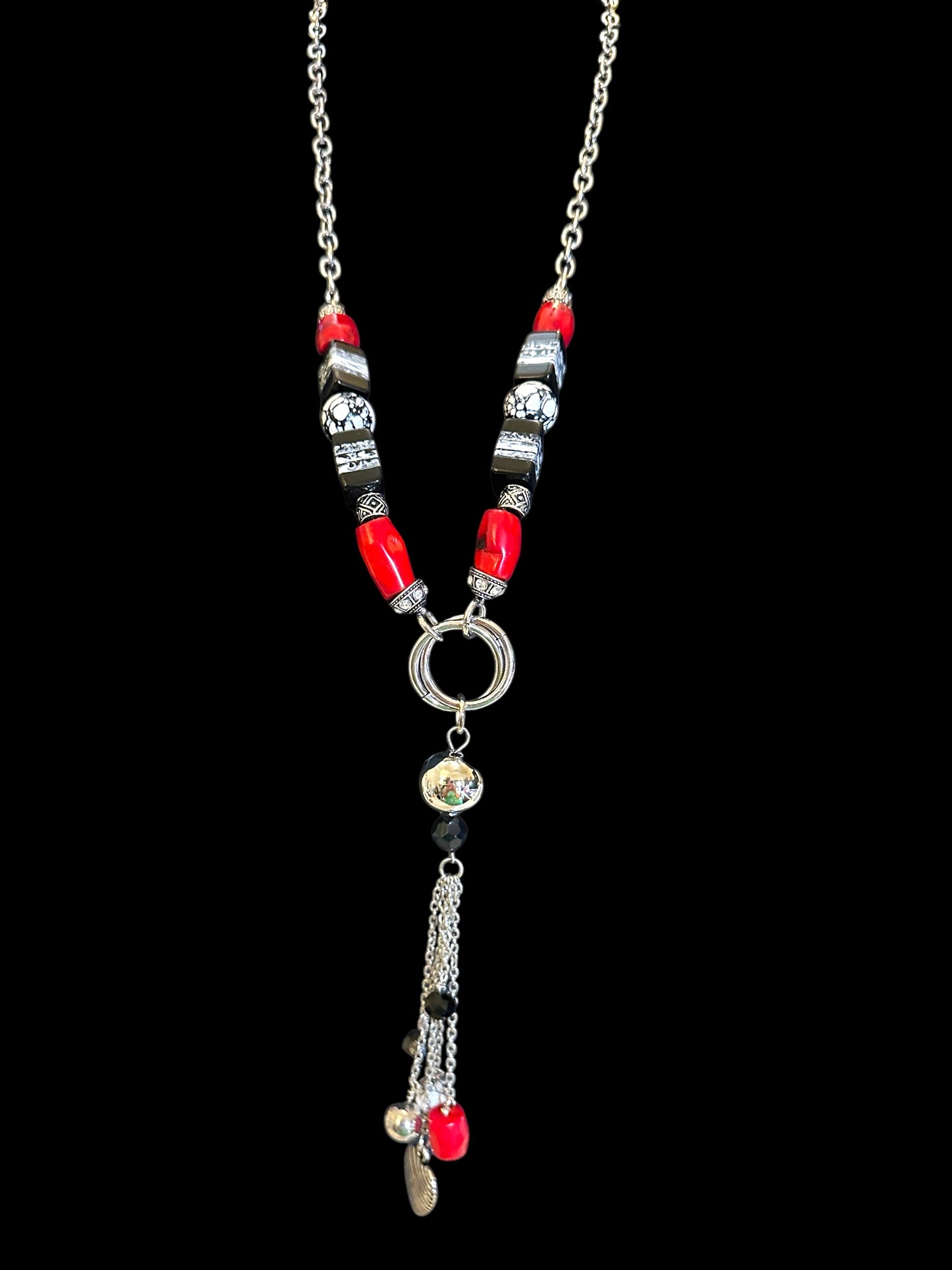 Red, black and white beaded necklace with silver chain and tassel