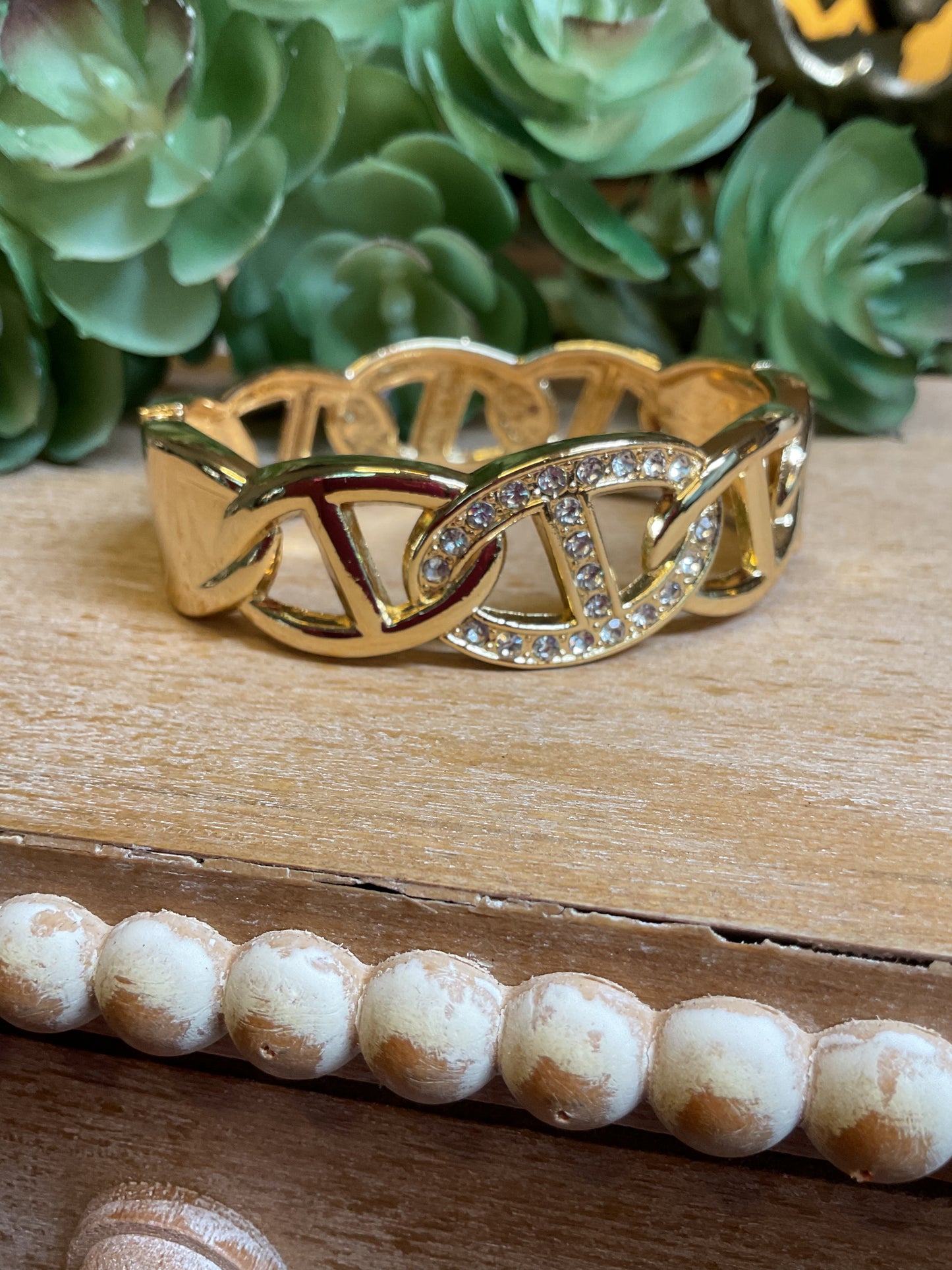 Gold with rhinestones clamp style bracelet