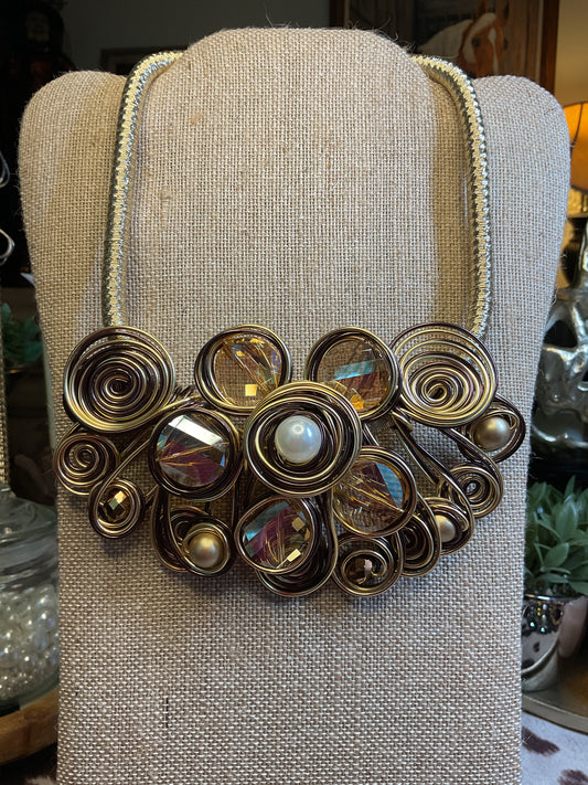 Large statement necklace with champagne color stones and pearls wrapped in gold wire