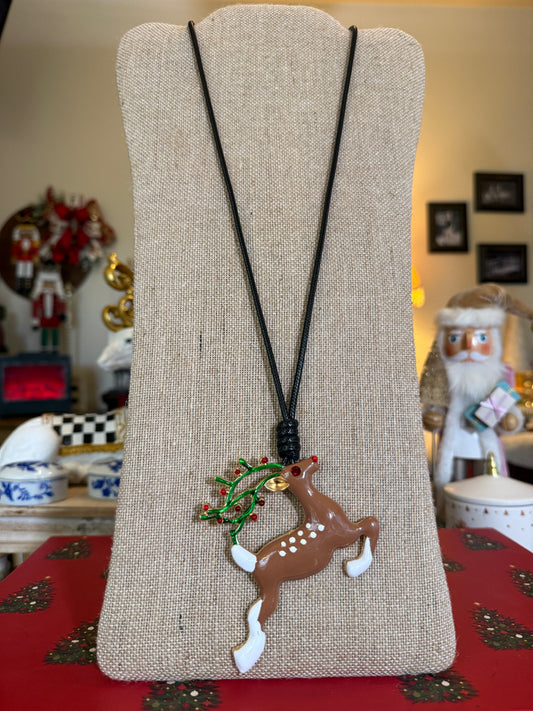 Large Reindeer pendant on a black cord necklace