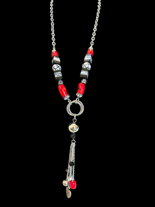 Red, black and white beaded necklace with silver chain and tassel