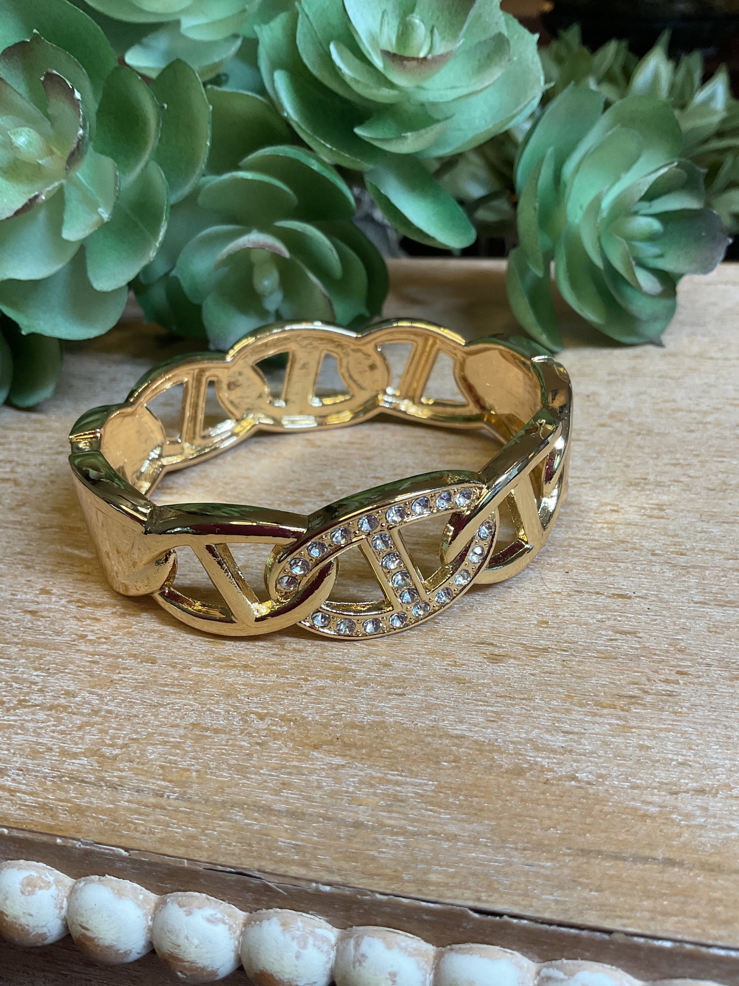 Gold with rhinestones clamp style bracelet