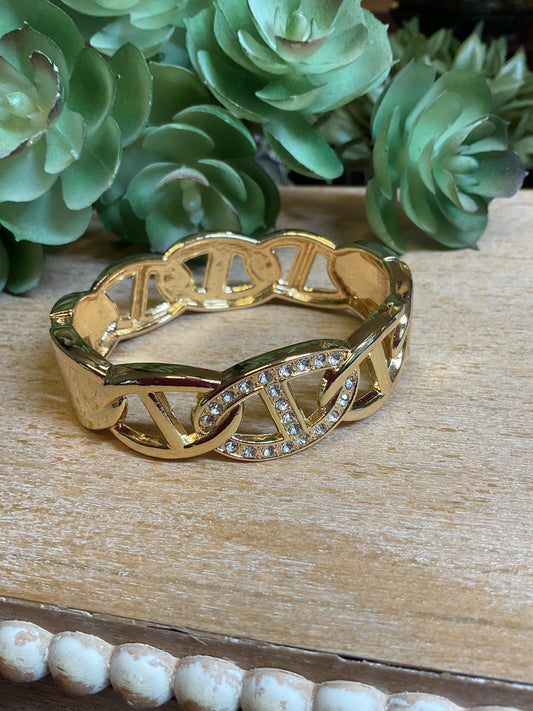 Gold with rhinestones clamp style bracelet