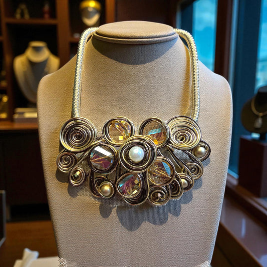 Large statement necklace with champagne color stones and pearls wrapped in gold wire