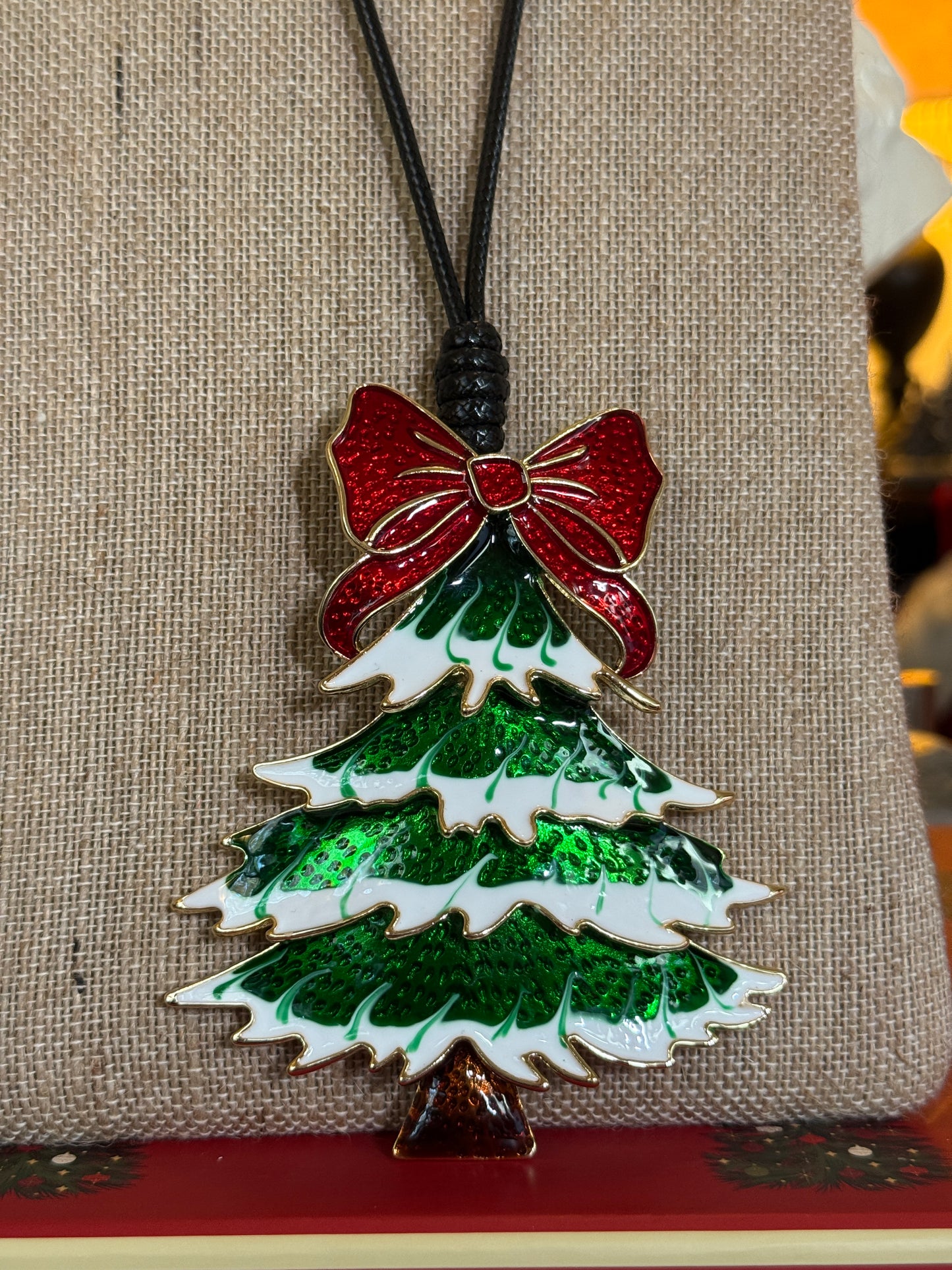 Large Christmas tree pendant on a black cord necklace