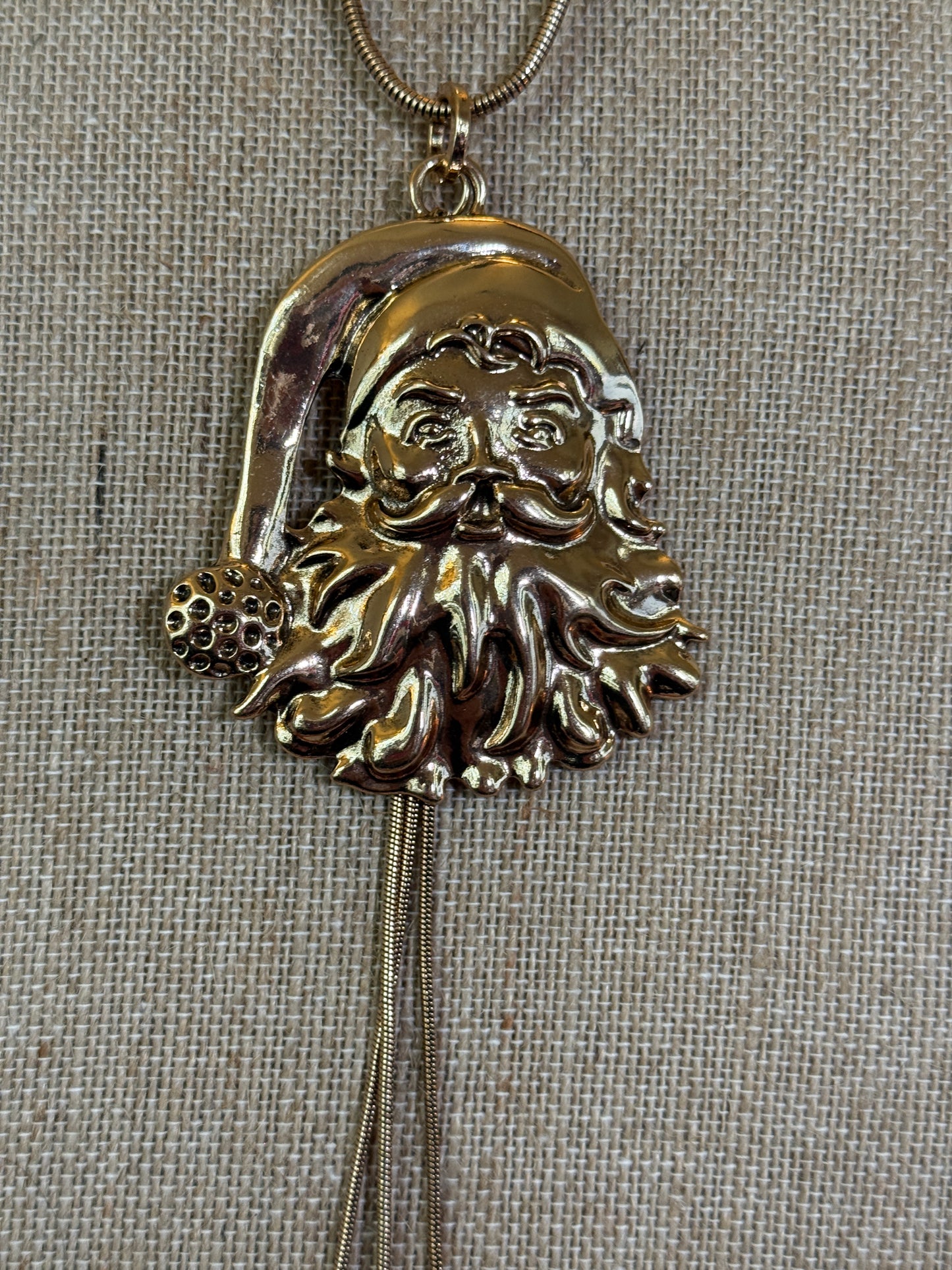Gold tone Santa face necklace
