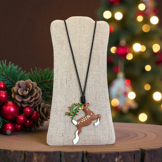 Large Reindeer pendant on a black cord necklace