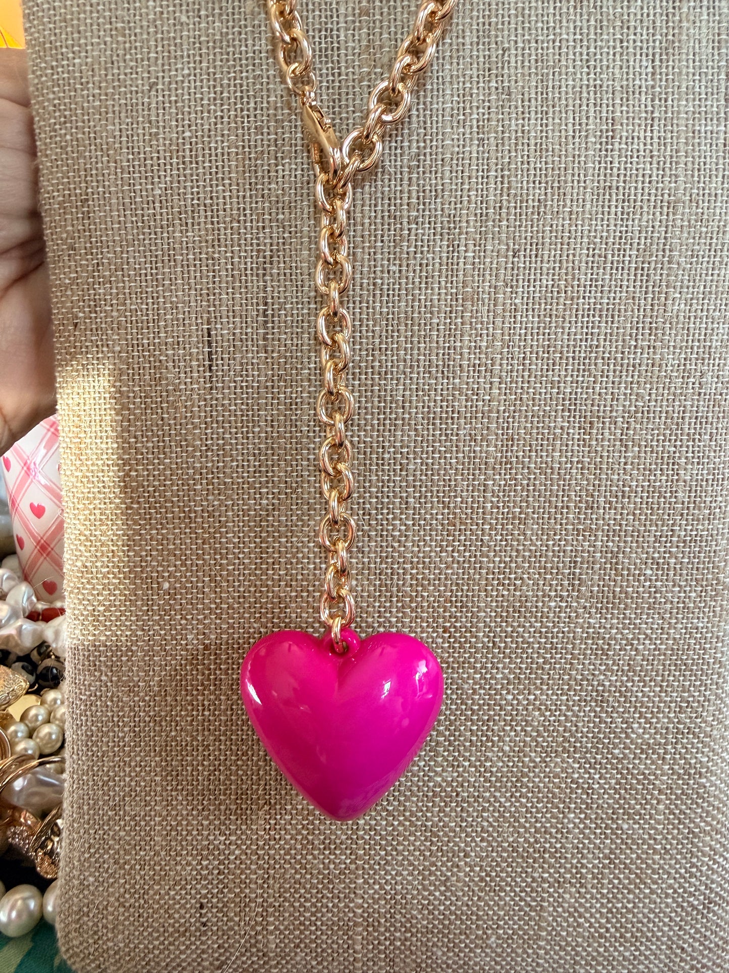 Hot PInk  puffy heart pendant on Long gold tone chain.