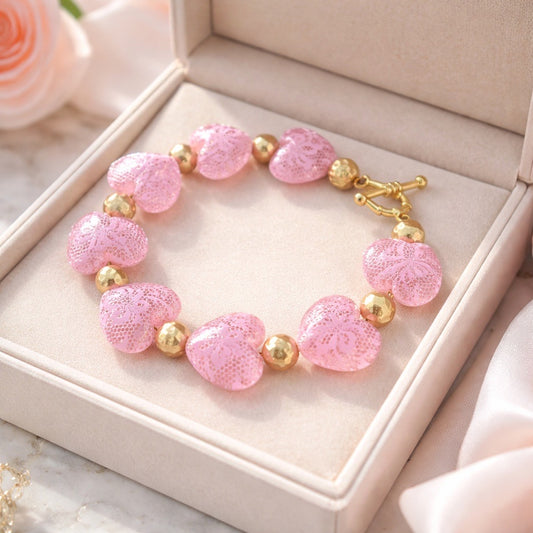 Pink hearts and gold tone Bracelet