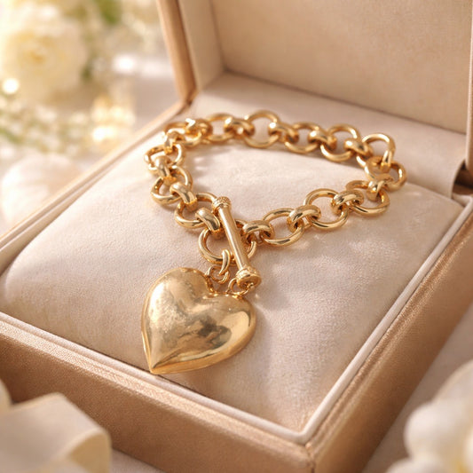 Gold tone Chain bracelet with puffy heart charm