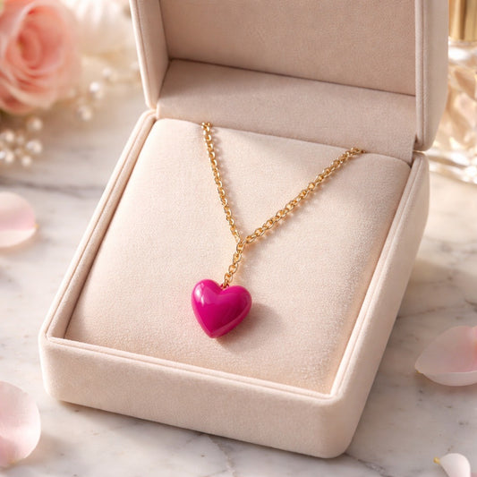 Hot PInk  puffy heart pendant on Long gold tone chain.