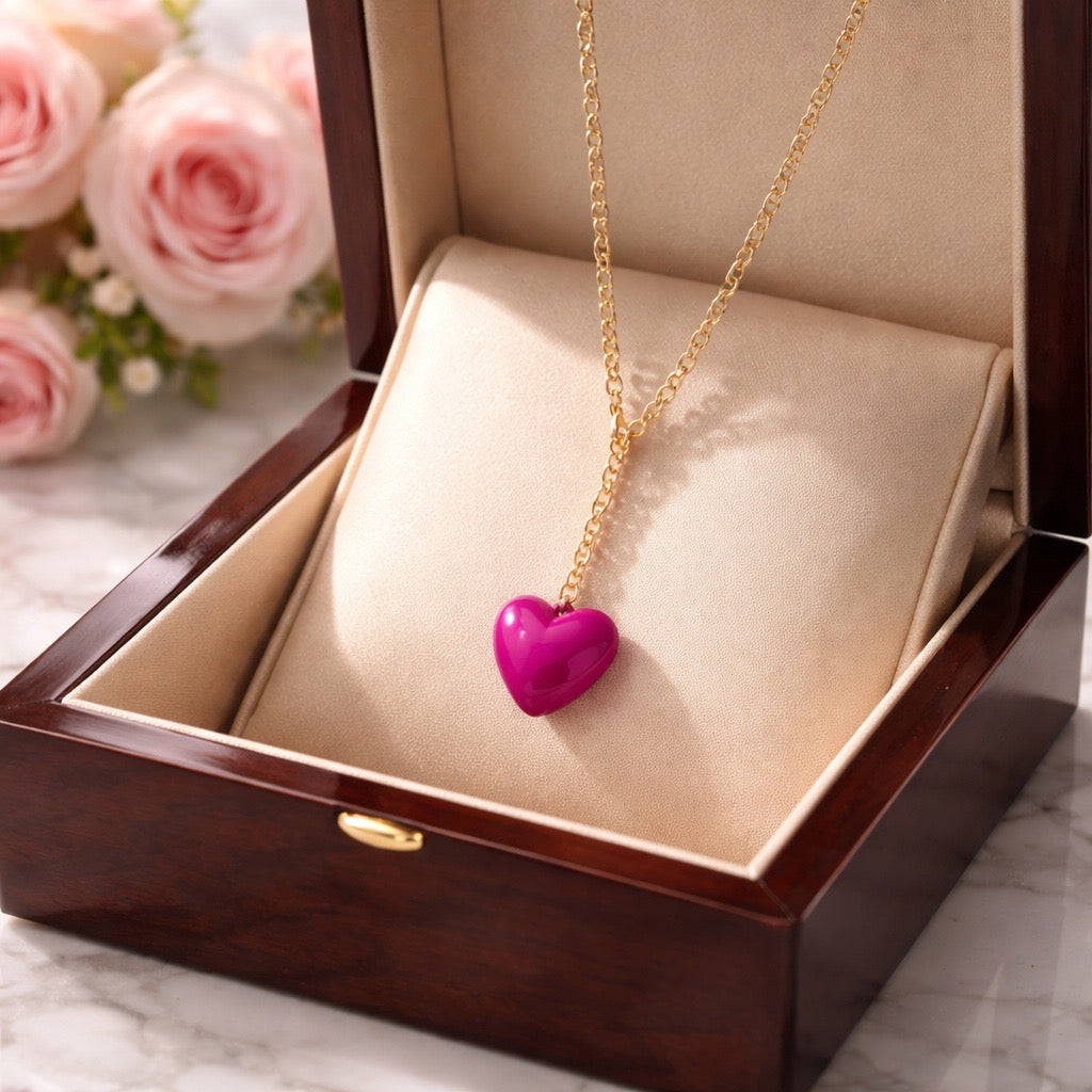 Hot PInk  puffy heart pendant on Long gold tone chain.