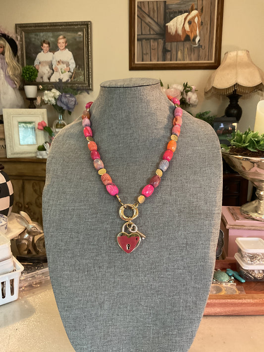 Colorful beaded necklace with heart locket pendant