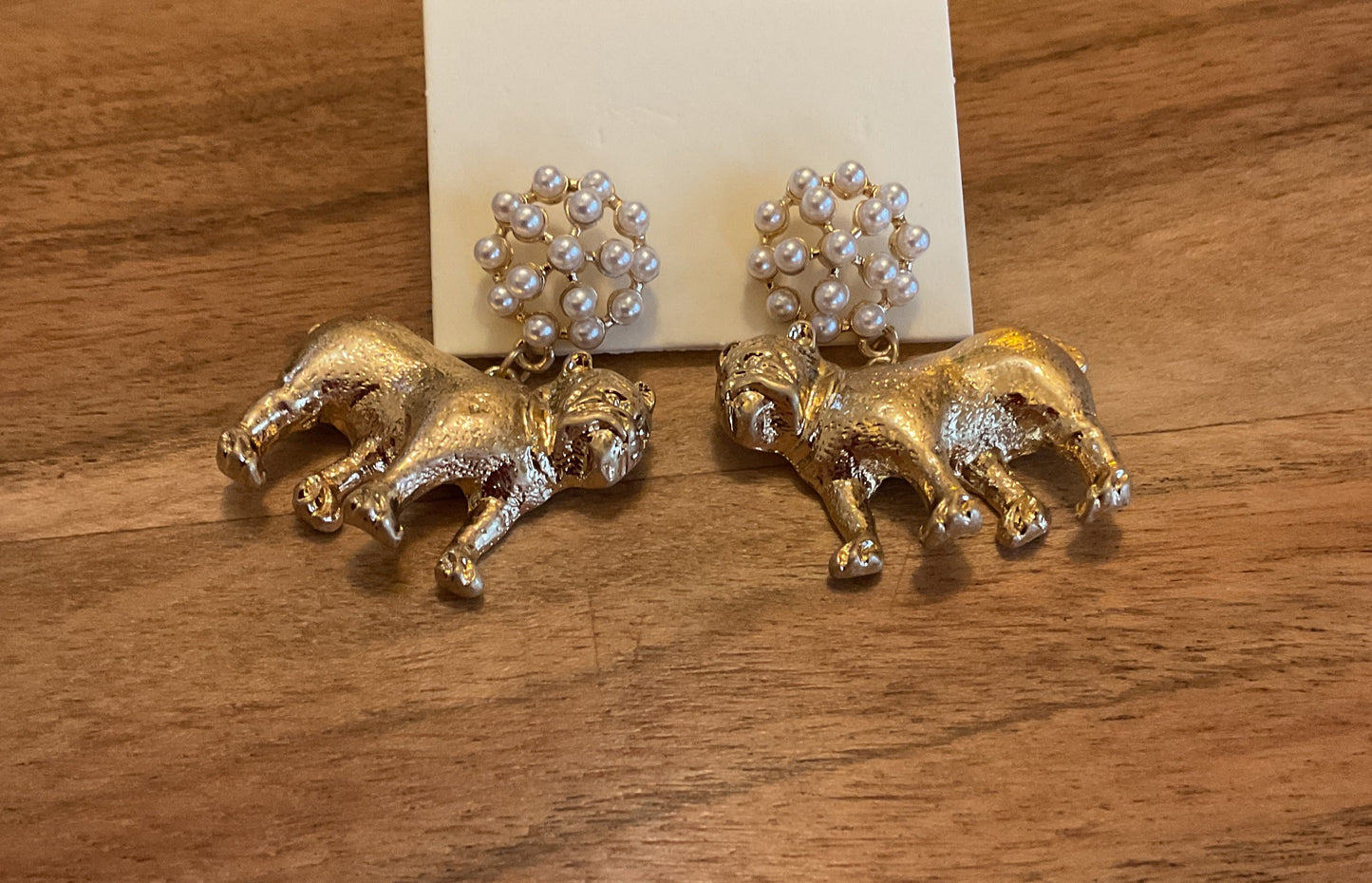 Gold and pearl dangle bulldog earrings for game day