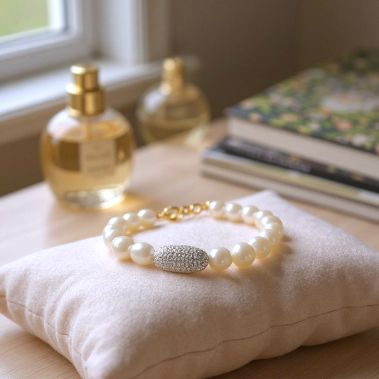 Freshwater pearl bracelet with a gold pave focal bead