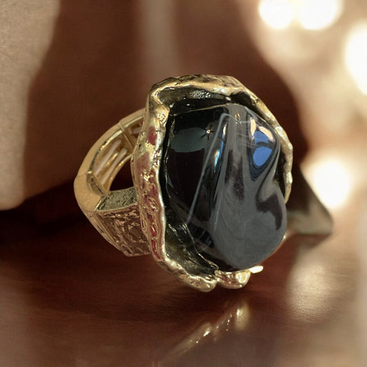 Large black stone, gold stretch ring