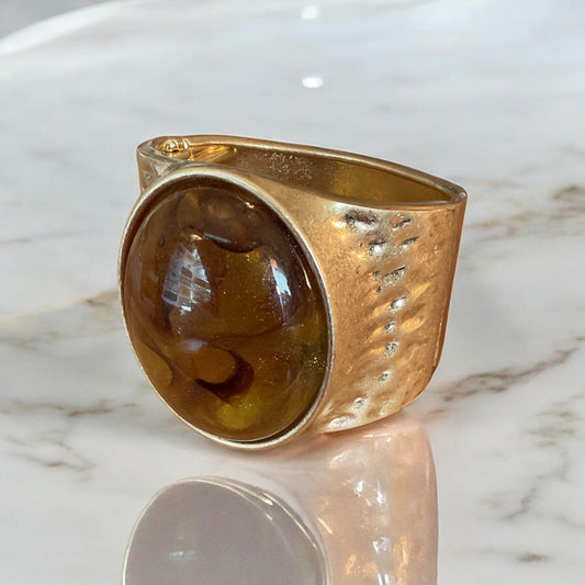 Large gold and brown stone clamp bracelet