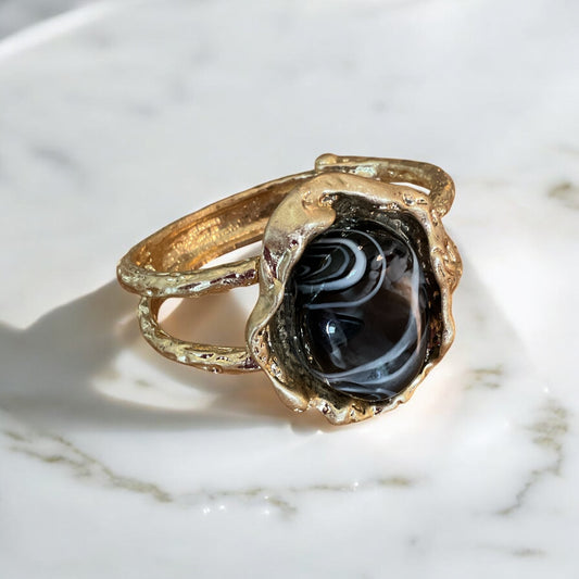 Large black stone set and gold statement bracelet