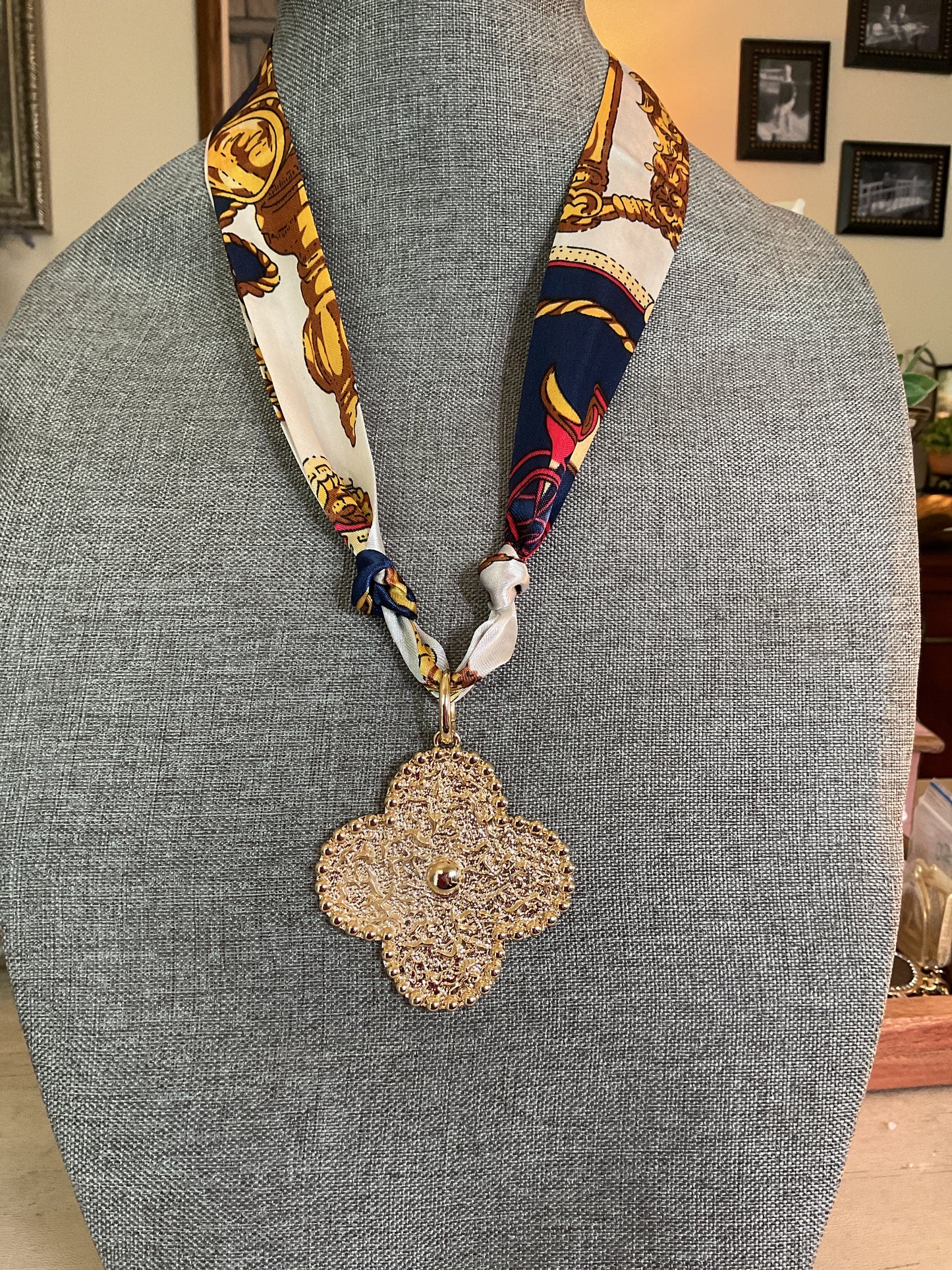 Navy gold and cream scarf, necklace with large gold, clover pendant