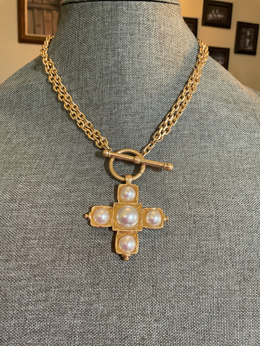 Gold double strand chain necklace with toggle closure, and pearl cross pendant