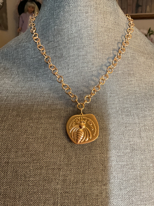 Gold chain necklace with gold bee pendant